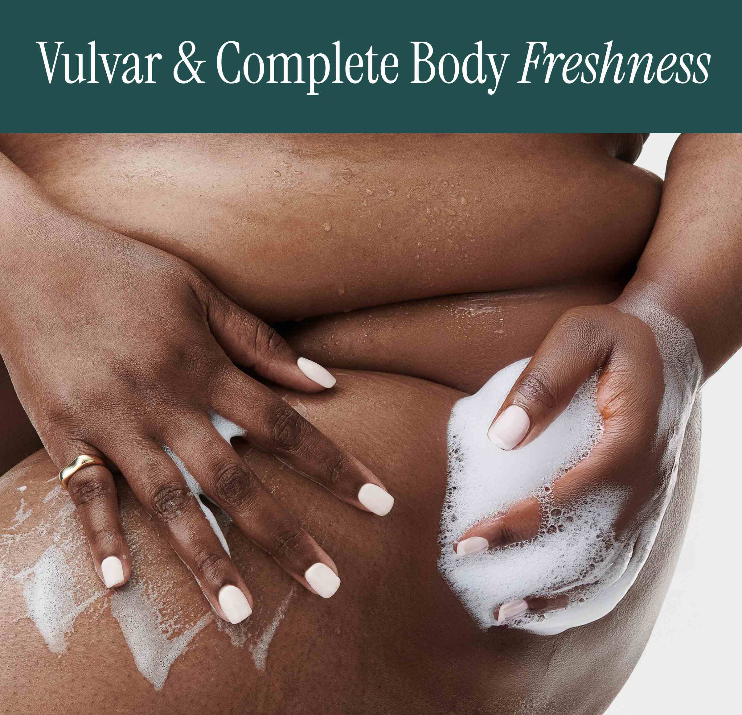 Person scrubbing their leg with a soap sponge, promoting vulvar and complete body freshness.