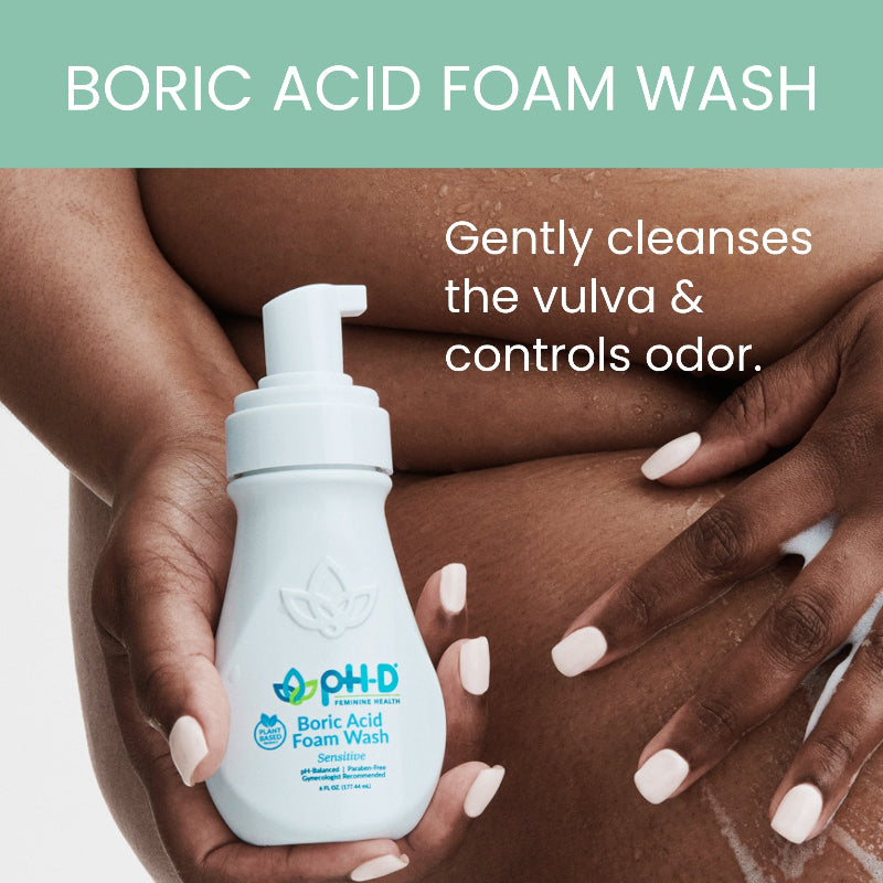 Boric acid foam wash bottle held by hands with text about product benefits