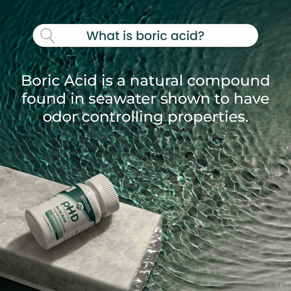 A bottle of pH-D Feminine Health Boric Acid Suppositories lie on a stone ledge beside rippling blue-green water. Text at the top reads, 'What is boric acid?' and the main text says, 'Boric Acid is a natural compound found in seawater shown to have odor controlling properties.