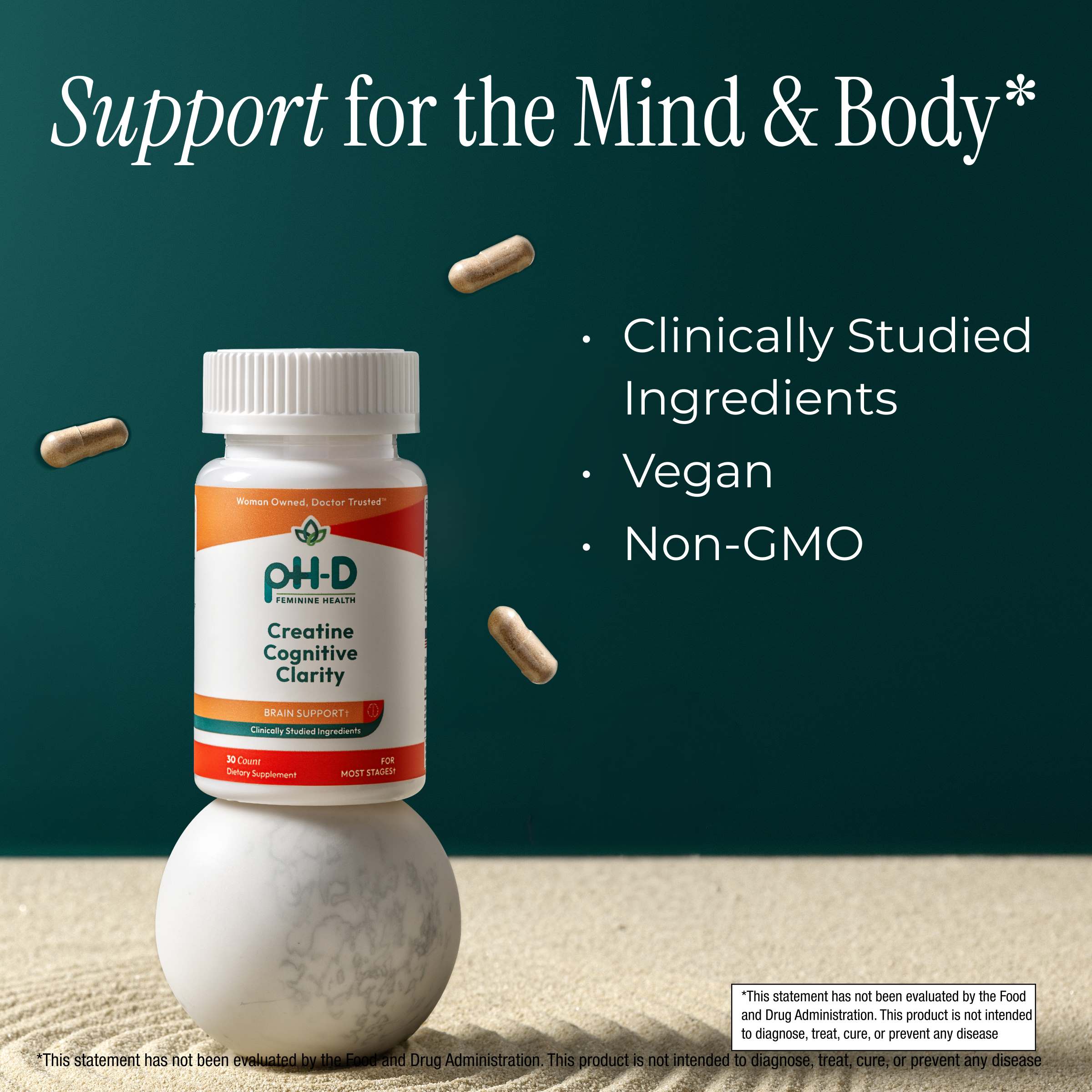 pH-D Creatine Cognitive Clarity bottle with capsules on a textured surface and dark green background, featuring text about support for the mind and body.