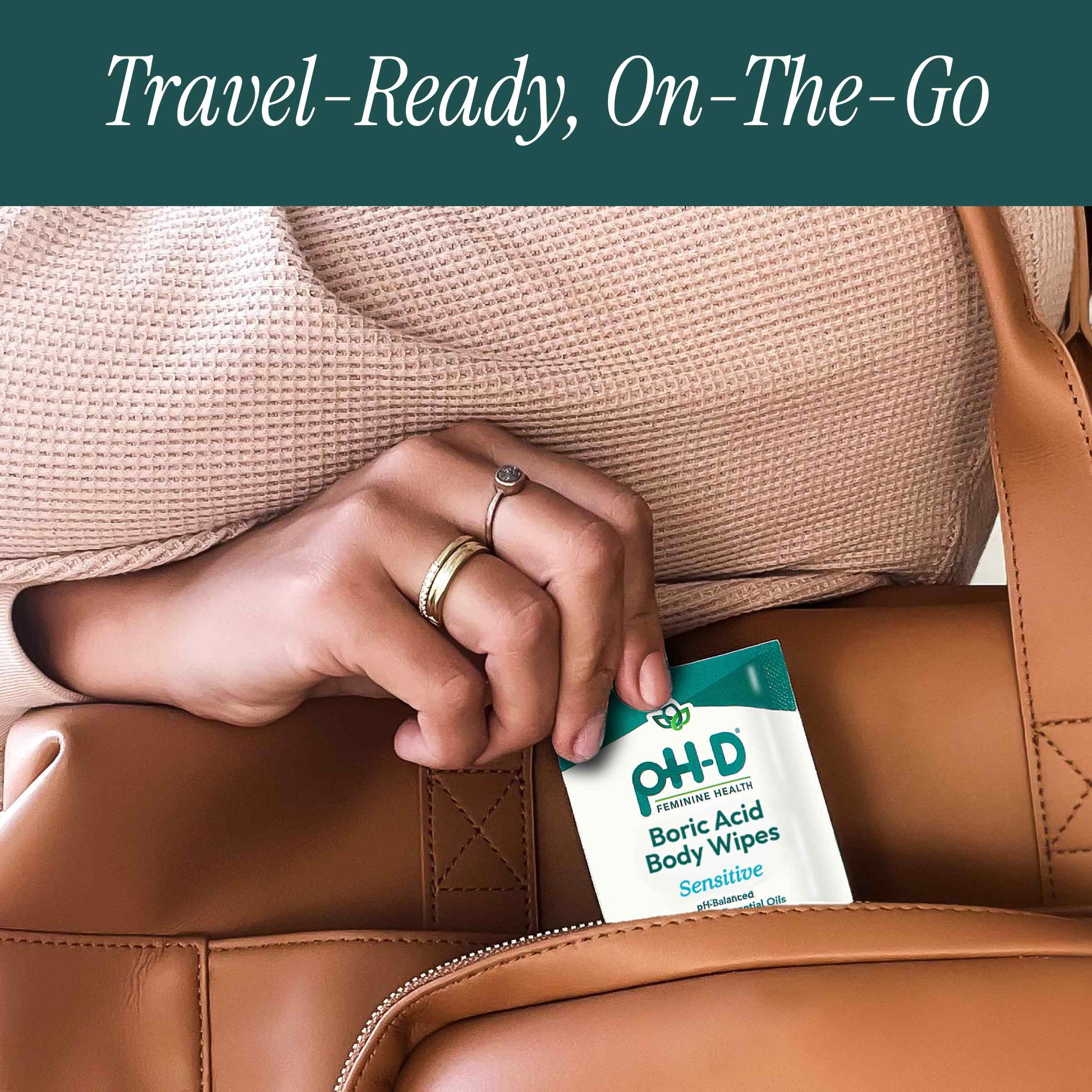 Woman placing a Boric Acid Body Wipe in her carry-on. "Travel-ready, on-the-go"